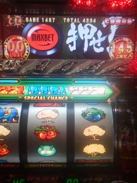 実機演出画面・GAME1487・TOTAL4334表示（出玉積み上げ中のシーン）